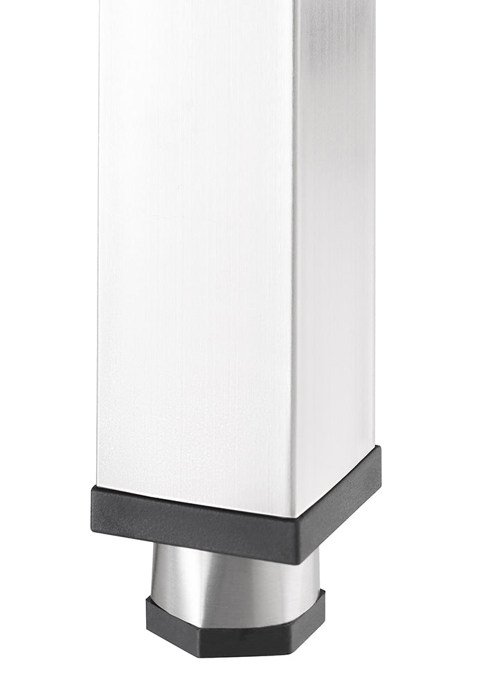 A close-up shot shows the bottom of a brushed metal square table leg, featuring a slightly tapered foot. The leg is capped with black plastic on both the top and bottom edges of the foot.
