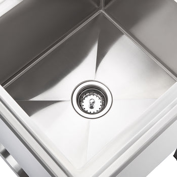 A top-down, slightly angled shot shows a clean, empty stainless steel sink with a drain in the center. The reflective surface of the sink shows subtle light reflections, and a small portion of the sink's stand is visible at the bottom.