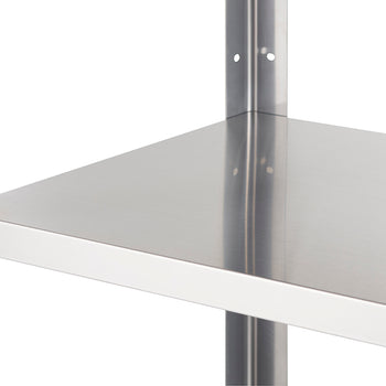 A close-up shot of a metal shelf corner, showing a flat, silver shelf resting on a white metal frame. The frame has visible holes for adjustable shelf height.