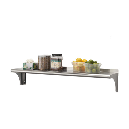 A stainless steel wall shelf is shown against a white background, holding various kitchen items including containers of spices, lemons, and limes. The shelf has a curved front edge and two support brackets.