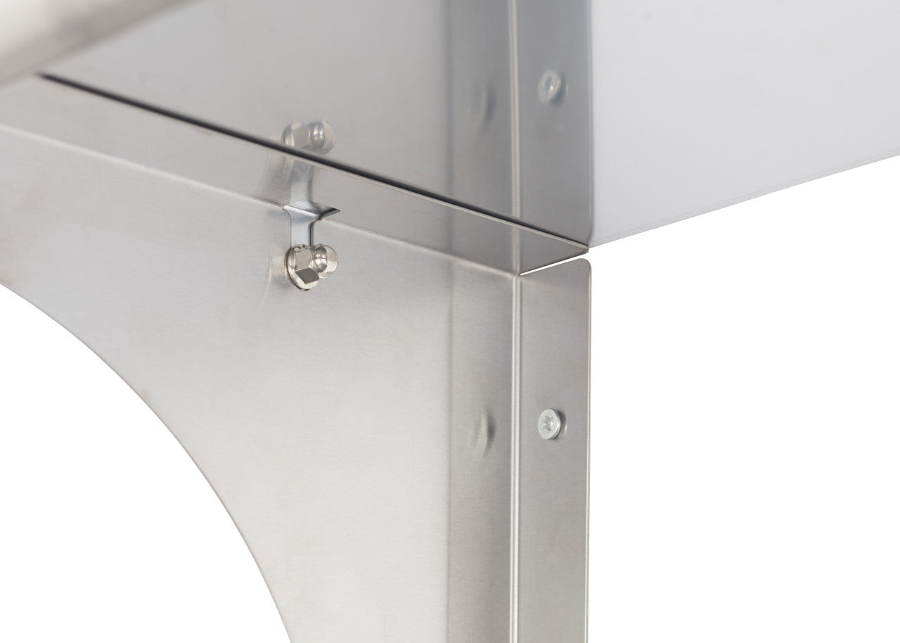 A close-up shot of the corner of a stainless steel shelf, showcasing the metal's reflectivity and the hardware used for assembly. The shelf features a rounded edge and visible screws, highlighting the industrial design and construction.