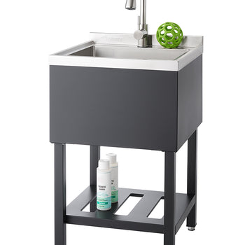 A modern, freestanding utility sink with a stainless steel basin and a black cabinet. The sink features a single-handle gooseneck faucet and a lower shelf holding two white bottles.
