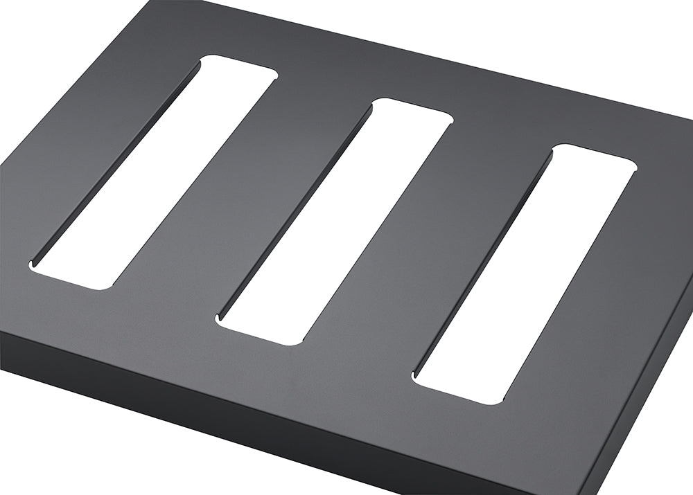 A matte black rectangular object with three elongated, rectangular shelf is shown from an angled, close-up perspective.