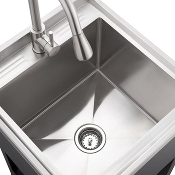 A top-down view shows a modern utility sink made of stainless steel, featuring a single basin with a drain at the center. A gooseneck faucet in a brushed metal finish is mounted on the back edge of the sink, ready for use.