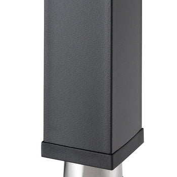 A close-up shot shows the bottom of a rectangular, dark gray furniture leg. The leg tapers into a silver, conical foot with a black cap, suggesting a modern design.