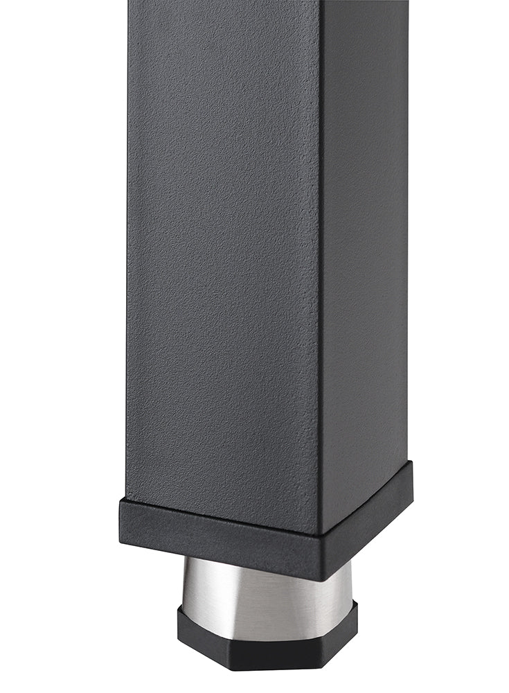 A close-up shot shows the bottom of a rectangular, dark gray furniture leg. The leg tapers into a silver, conical foot with a black cap, suggesting a modern design.