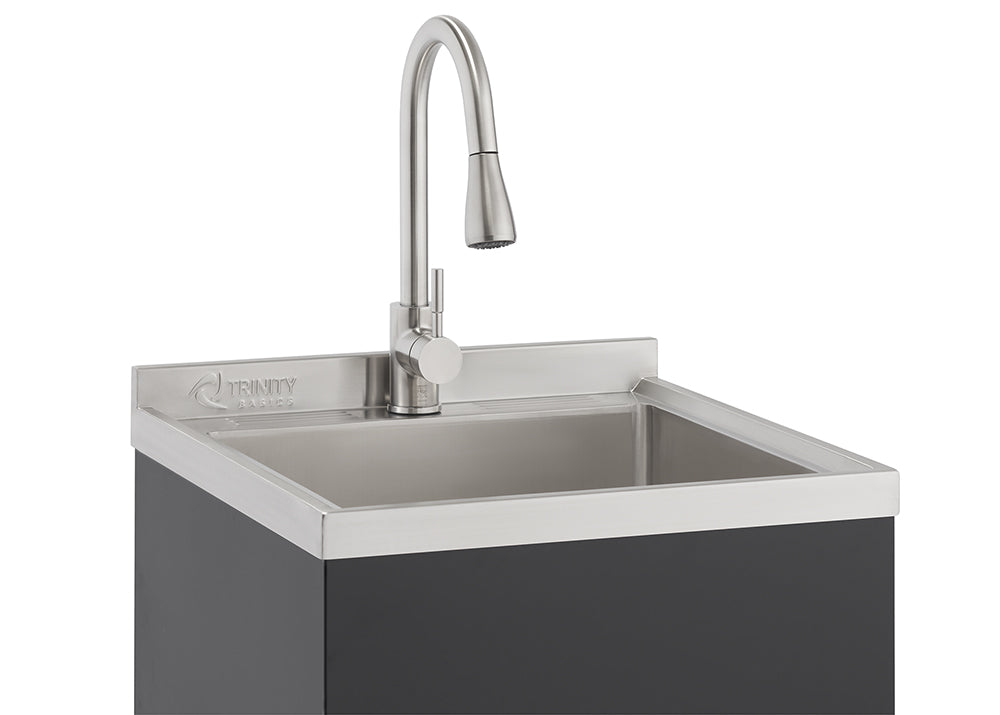 A modern stainless steel utility sink with a high-arc pull-down faucet is shown. The sink is integrated into a black cabinet, and the "TRINITY" logo is visible on the backsplash.