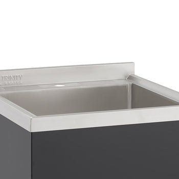A close-up shot shows a stainless steel utility sink with a brushed finish, set atop a dark grey cabinet. The 