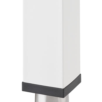 A close-up shot shows the bottom of a white rectangular table leg with a black base. Beneath the black base, a silver, slightly tapered foot extends downwards, also with a black tip.