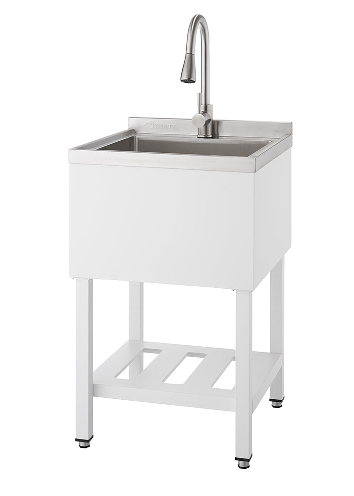 A freestanding white laundry utility sink with a stainless steel basin and a brushed nickel gooseneck faucet is shown from a frontal angle. The sink unit has an open shelf beneath the basin and stands on four legs with adjustable feet.