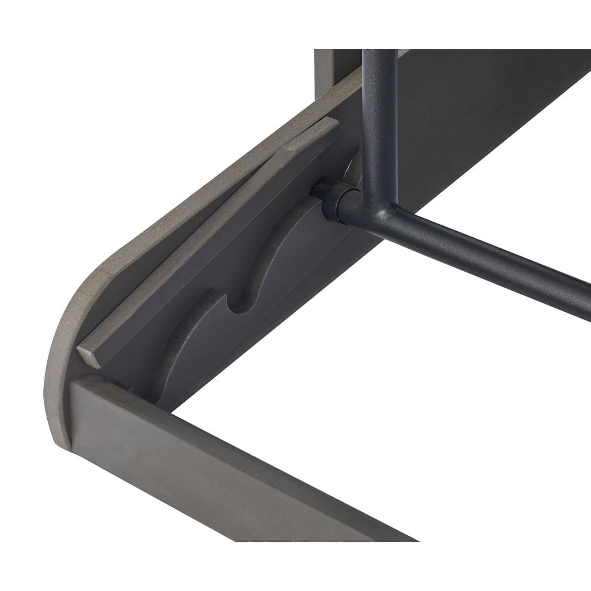 A close-up shows the underside of a dark gray table with rounded edges and a black metal support rod. The table's construction reveals layered wood or composite material, with curved cutouts visible along the inner edge.