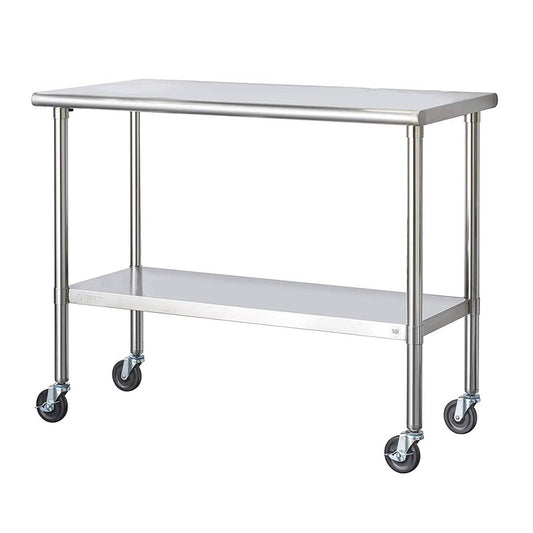 A stainless steel utility table with a lower shelf and four caster wheels for mobility. The table has a smooth top surface and is designed for use in industrial or commercial settings.