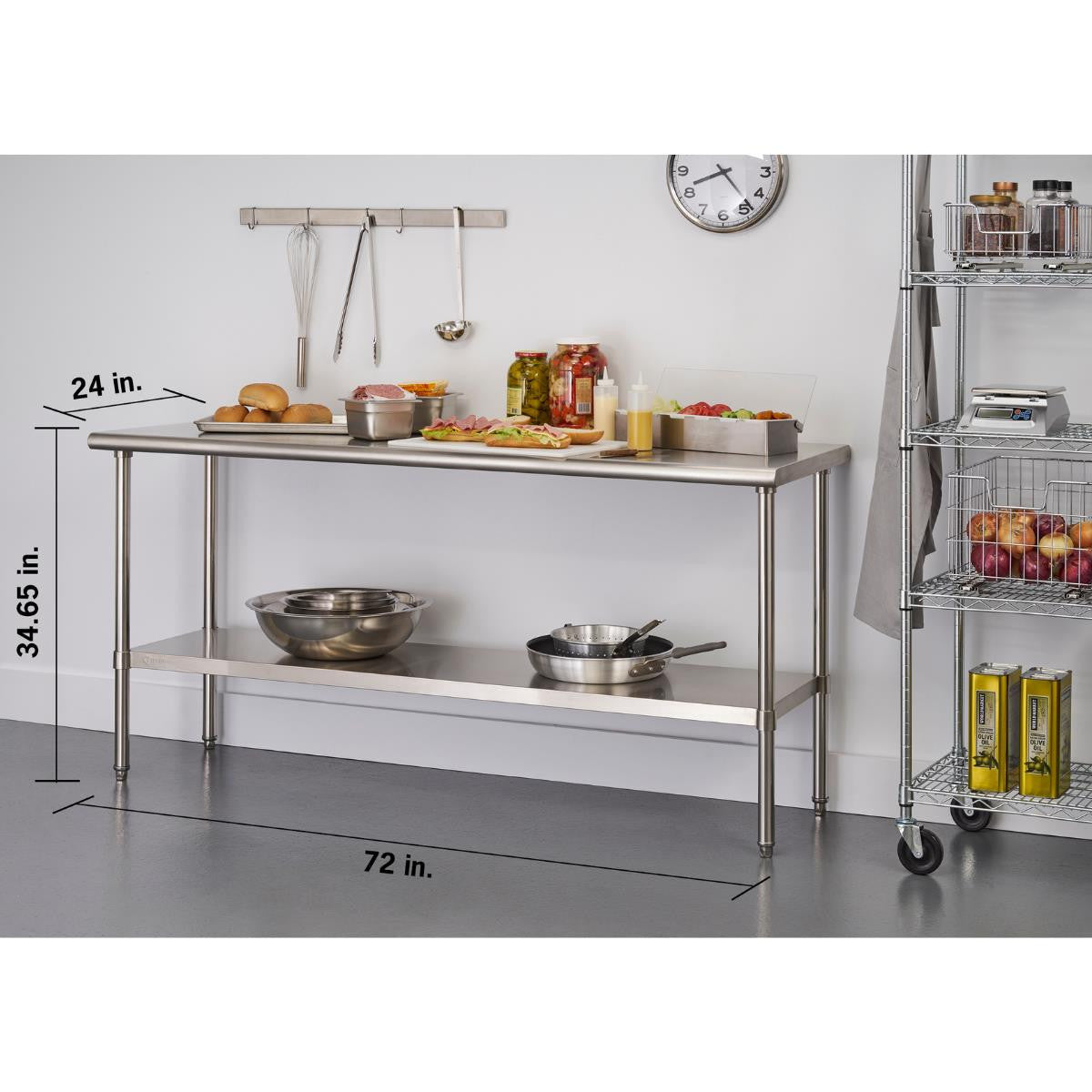 A stainless steel food preparation table with two shelves stands against a white wall in a kitchen setting. The table holds various food items and kitchen utensils, and its dimensions are indicated as 72 inches wide, 24 inches deep, and 35 inches tall.