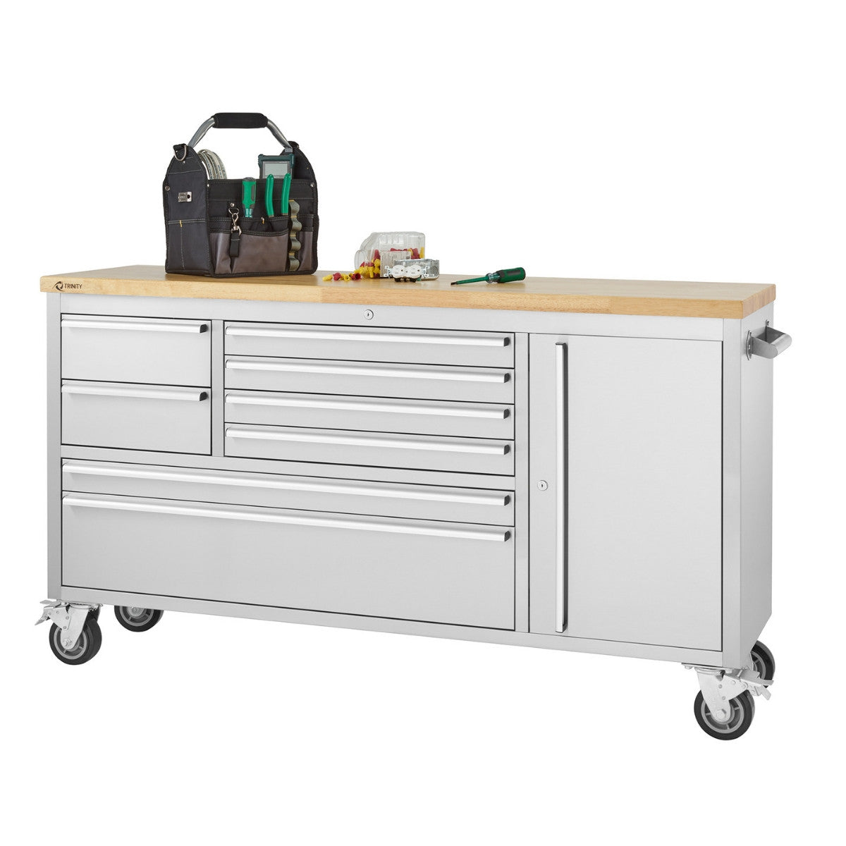 A stainless steel garage rolling workbench with a light-colored wooden top is shown. Several drawers and a cabinet door are visible on the front, and a tool bag and various tools are placed on the top surface.