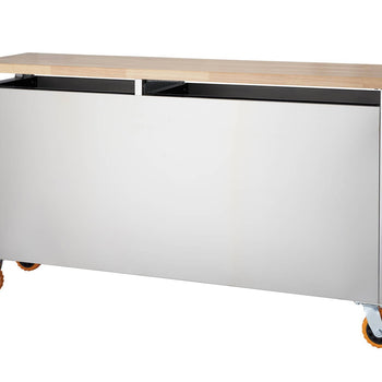 A stainless steel rolling workbench with a light-colored wooden top is shown angled to the right. The workbench has four orange caster wheels and a handle on the right side.