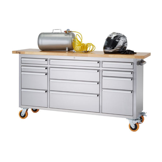 A Trinity 72"W x 19"D Stainless Steel Rolling Workbench with motorcycle helmet and air canister on the solid wood top and is equipped with wheels for mobility.