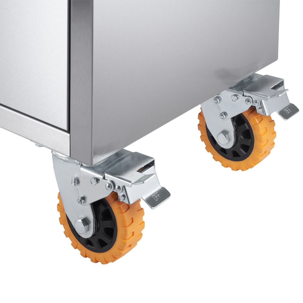 A close-up shot shows the bottom corner of a stainless steel rolling workbench. Two heavy-duty orange and black caster wheels with locking mechanisms are visible, attached to the base of the workbench.