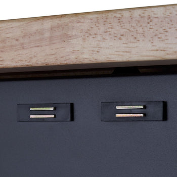 A close-up shows two rectangular black plates attached to a dark gray or black surface, likely a cabinet door. Each plate has two horizontal silver bars recessed within it.