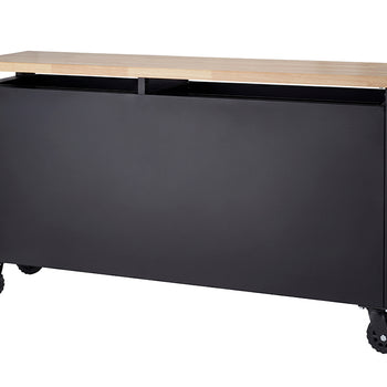The back view of a matte black mobile tool workbench displays a smooth, solid rear panel beneath a light wood worktop. Set against a plain white background, the unit is equipped with heavy-duty locking casters and a side grab handle for easy maneuverability.