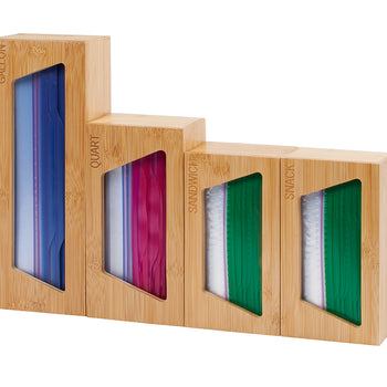 A light-colored wooden organizer with four compartments holds different sizes of plastic storage bags. The compartments are labeled 