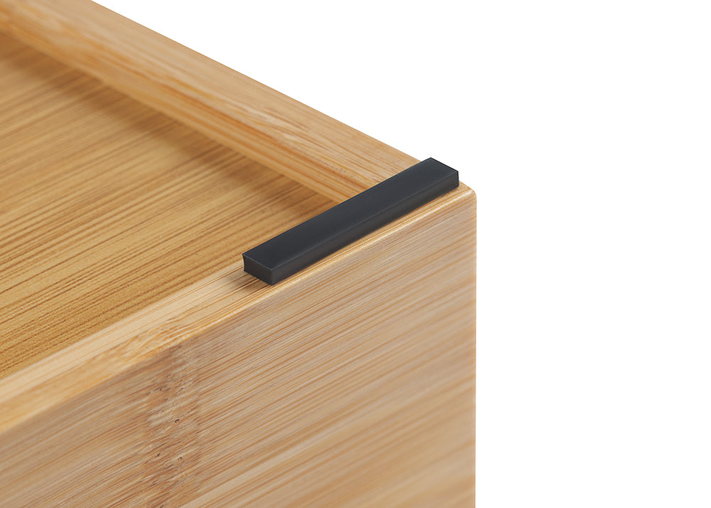 A close-up shot of a bamboo organizer shows its natural wood grain and a sleek black rectangular handle or corner accent.