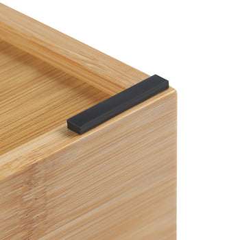 A close-up shot of a bamboo organizer shows its natural wood grain and a sleek black rectangular handle or corner accent.
