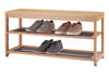 A long, narrow bench made of light-colored wood, possibly bamboo, doubles as a shoe rack. Two pairs of men's dress shoes and two pairs of casual sneakers are neatly arranged on the two slatted shelves beneath the bench seat.
