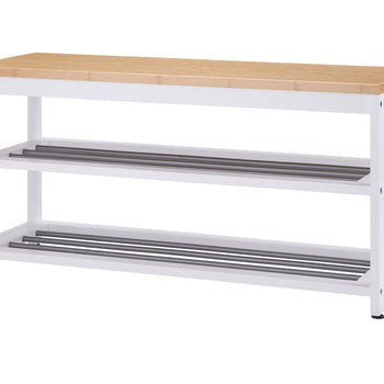A long, rectangular bench with a natural wood top and white frame. It has two lower shelves with metal rods for shoe storage.