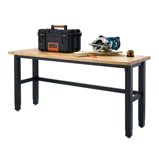 A wood top work table is shown with a black toolbox, a circular saw, and a tape measure on top. The table has black metal legs and a light-colored wooden surface.