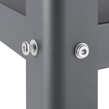 A close-up shot shows the leg of a gray metal kitchen cart, highlighting the two silver screws used for assembly. The screws are visible on the outside of the leg, one with a flat head and the other with a hex head.