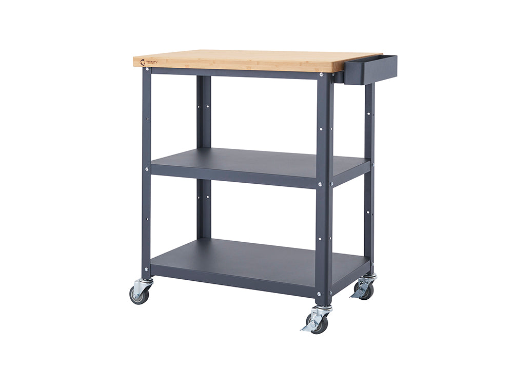 A Trinity 32" Bamboo and Metal Kitchen Cart with wheels is shown from a front-facing perspective against a white background. The cart features a light-colored bamboo butcher block top, two dark gray metal shelves, and a dark gray caddy attached to the right side of the top shelf.