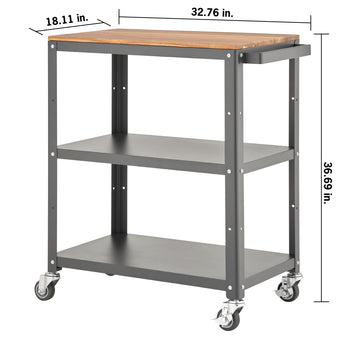 A three-tier rolling utility cart features a wooden countertop and two black metal shelves supported by a dark gray frame on casters. The image includes dimension labels indicating a width of 32.76 in., a depth of 18.11 in., and a height of 36.69 in.