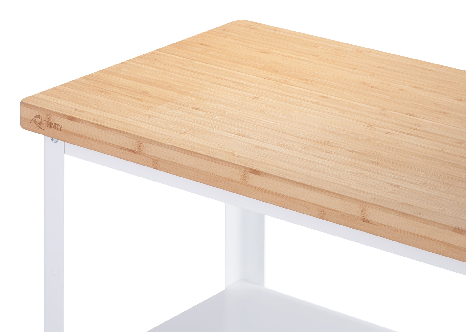 
A close-up shot shows the corner of a light-colored bamboo countertop on a white frame, likely part of a kitchen cart or side table. The grain of the bamboo is clearly visible, and a subtle logo or etching is present on the front edge of the countertop.
