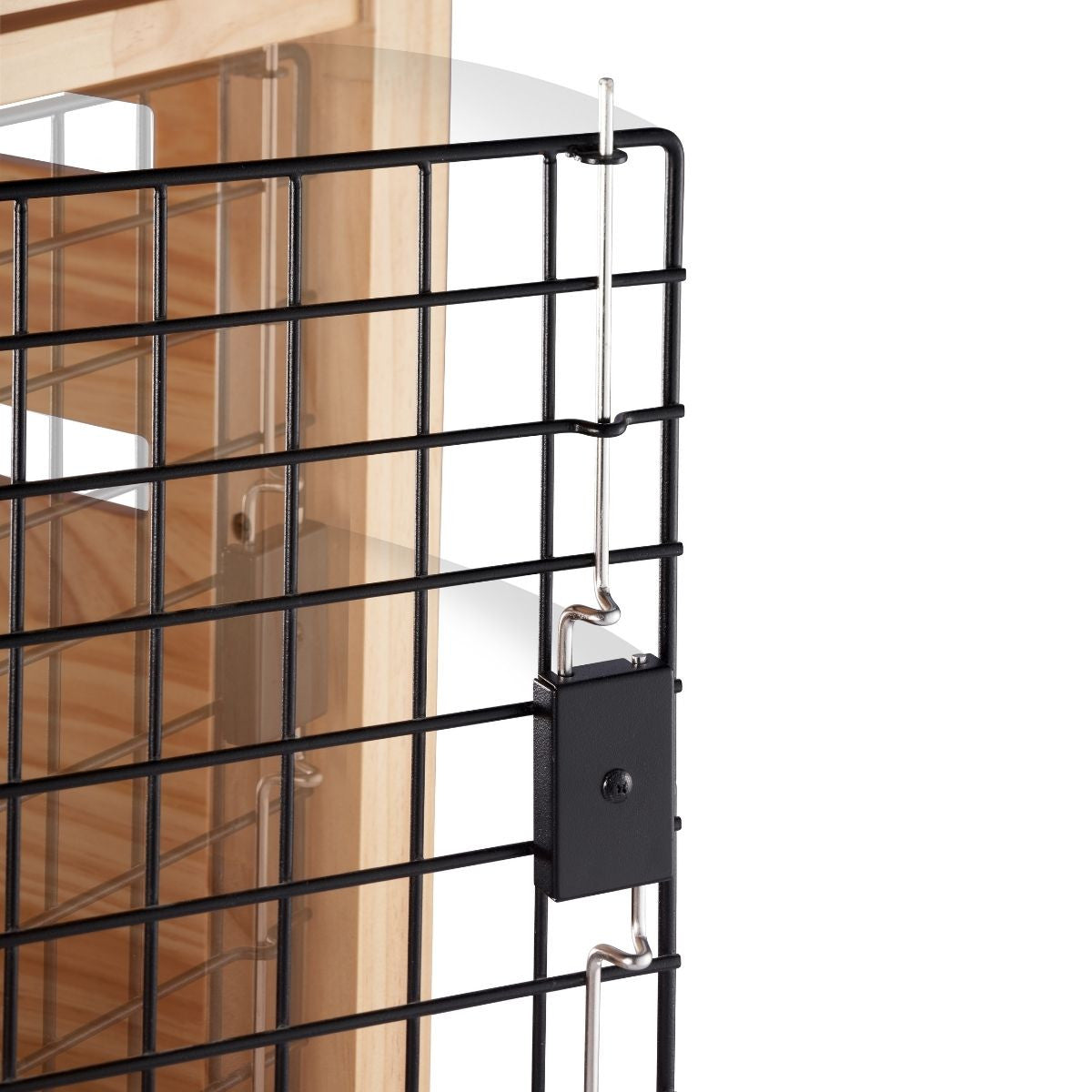 A close-up shows the side of a black wire mesh storage unit with wooden shelves. A silver metal rod extends vertically along the right side, connected to a black rectangular mechanism with a screw.