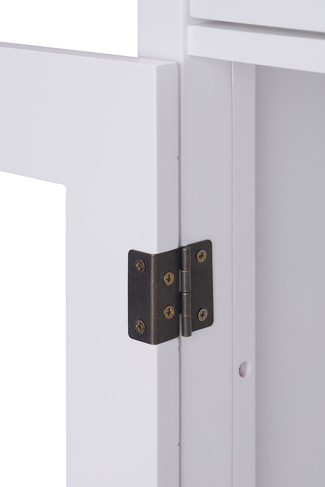 A close-up shot of a dark-colored, rectangular hinge connecting a white cabinet door to its frame. The hinge features four visible screws, two on each side, securing it to the wood.