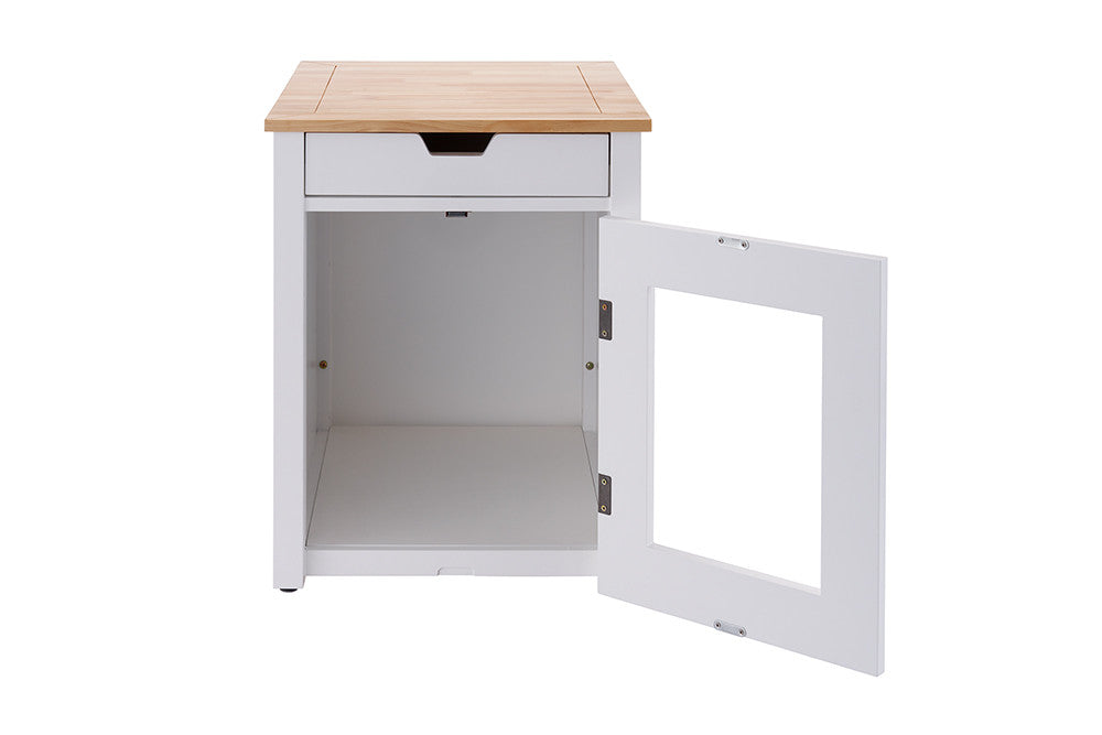 A white wooden end table with a light wood top and a small drawer, featuring an open door revealing an empty interior space. The door has a rectangular cutout in the center.