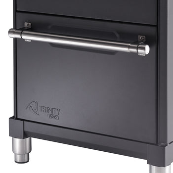 A close-up shot shows the lower left portion of a black, metal storage cabinet. A silver, cylindrical handle is mounted horizontally on a drawer, and the 