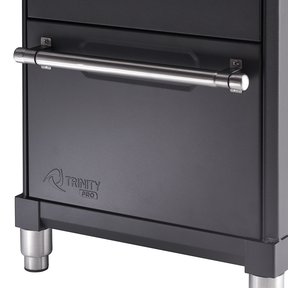 A close-up shot shows the lower left portion of a black, metal storage cabinet. A silver, cylindrical handle is mounted horizontally on a drawer, and the "TRINITY PRO" logo is visible below it.