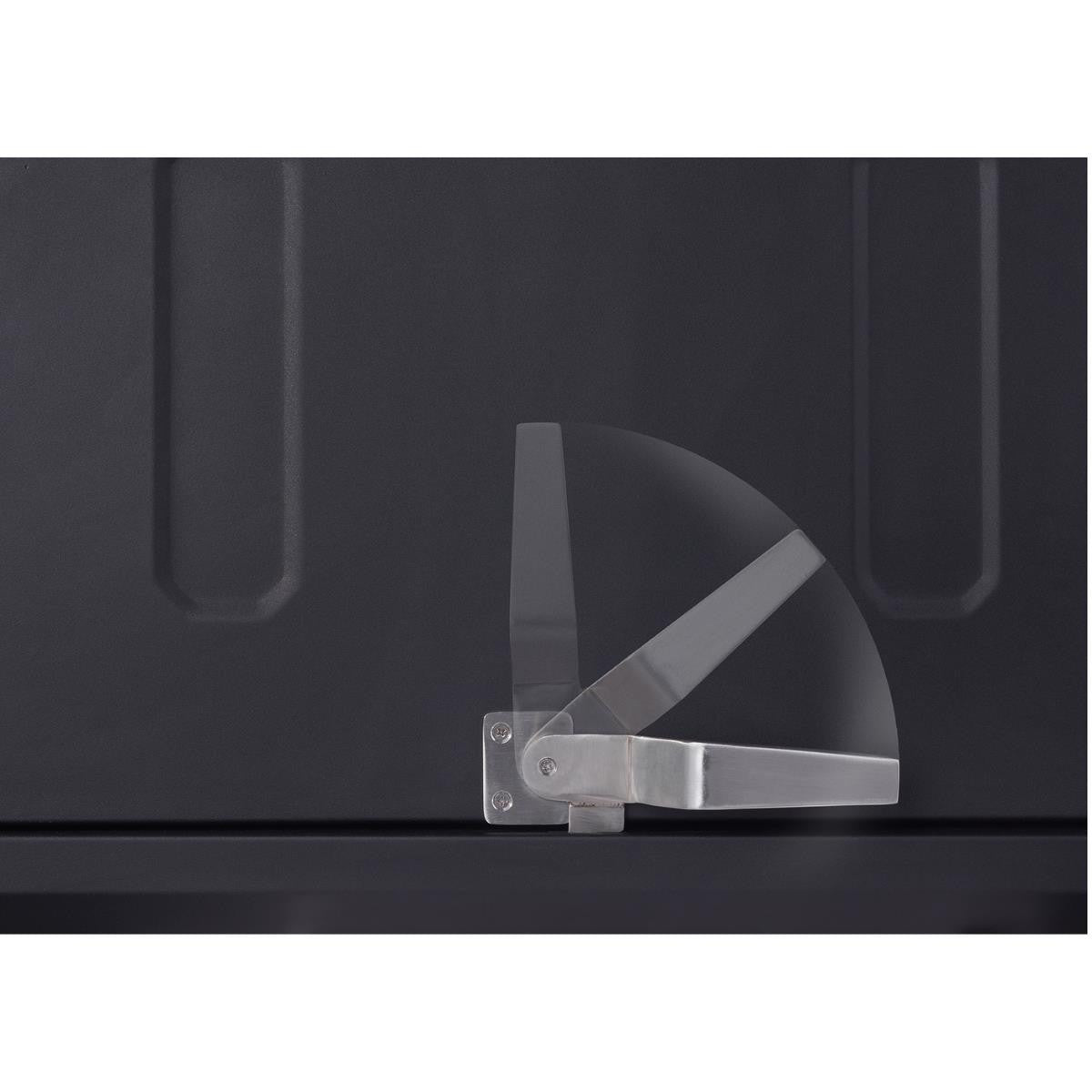 A close-up shows the stainless steel handle and hinge mechanism of a black metal cabinet door. The handle is depicted in a closed, horizontal position and with a motion blur effect showing its arc of movement to an open, vertical position.