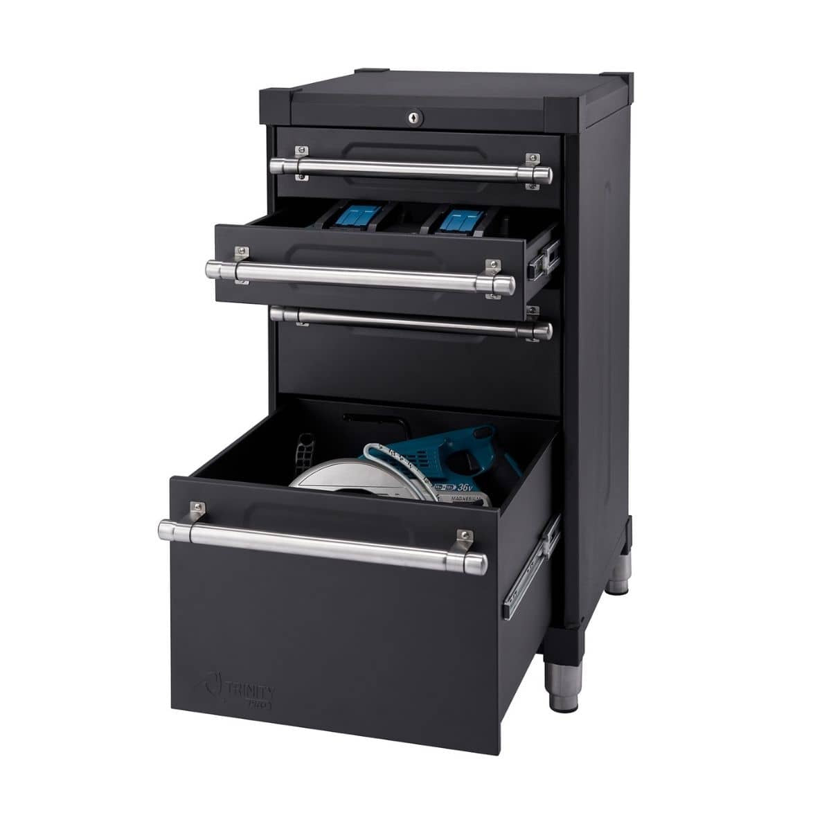 This is a close-up studio shot of a black Trinity Pro Garage Base Cabinet with three drawers. The top two drawers are partially open, revealing blue tool organizers, while the bottom drawer is more open, showing a circular saw and a drill inside.