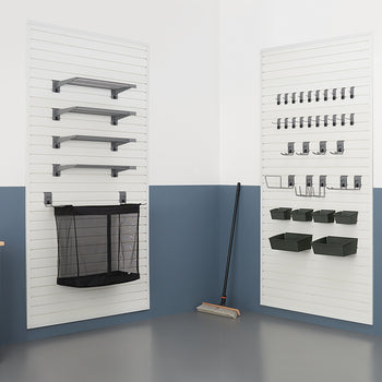 Two white slatwall panels are mounted on a wall with a blue and white paint scheme, showcasing various garage organization solutions. The left panel features four shelves and a large mesh storage bin, while the right panel displays an assortment of hooks and smaller storage bins.