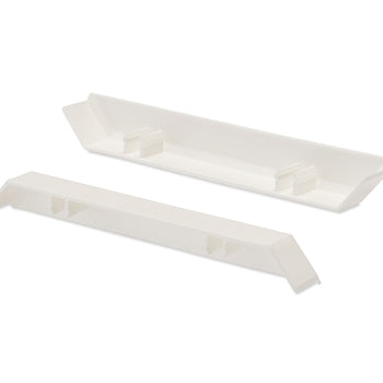 Two elongated, white plastic objects are shown on a white background. One object is inverted, revealing four hollowed-out rectangular support structures along its length.
