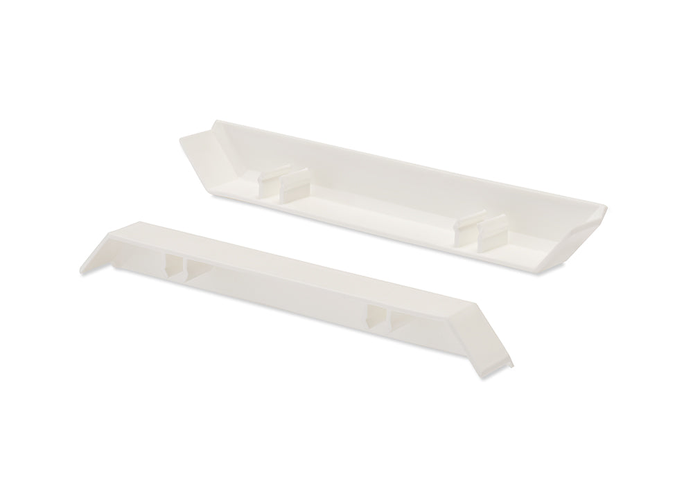 Two translucent white, plastic pieces are shown against a white background. One piece is shown from a higher angle, and the other from a lower angle. Both pieces are elongated and tapered at each end, with two sets of angled brackets on the interior surface.