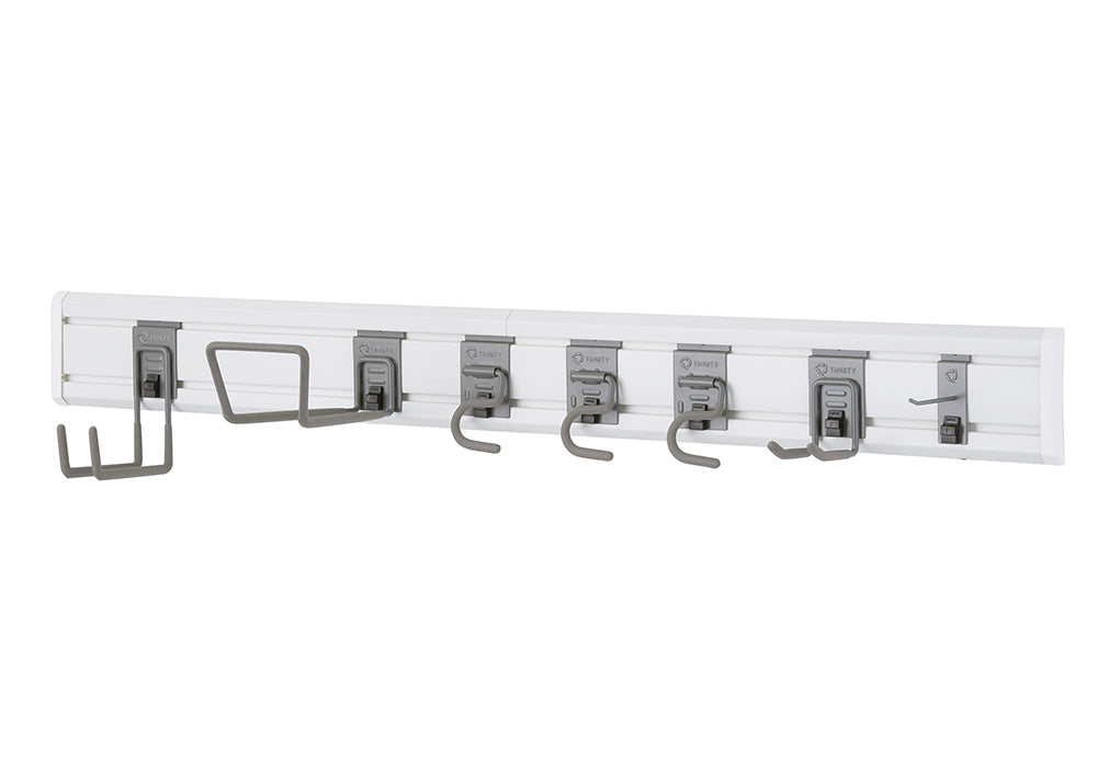 A horizontal, wall-mounted storage system with a white track and various gray-colored hooks. The hooks are spaced along the track and are designed to hold a variety of items, such as tools or sports equipment.