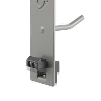 A close-up image of a metal retail display hook with a locking mechanism attached to a vertical panel. The lock has a black plastic casing with two visible screws and a spring-loaded mechanism inside.