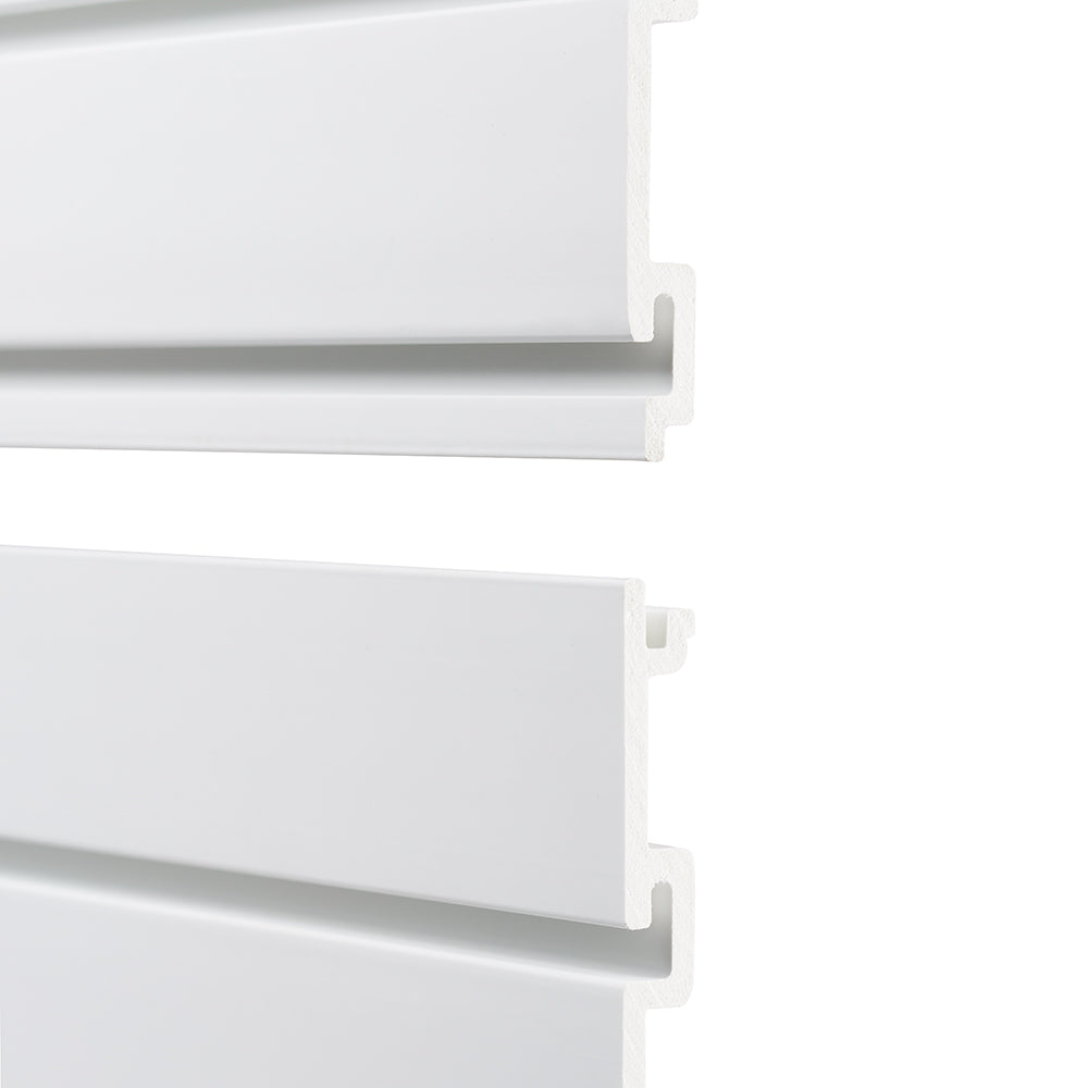A close-up image of two white interlocking wall panels with a tongue-and-groove design, showing their connection mechanism. The panels have a smooth finish and are slightly separated to highlight their interlocking edges.