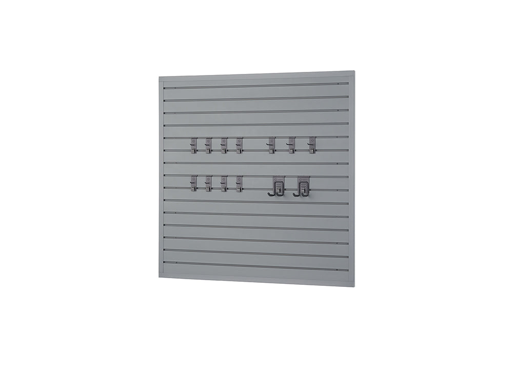 A rectangular, grey slatwall panel is mounted on a white background, featuring horizontal grooves. Various metal hooks and hangers are inserted into the grooves, organized into two rows across the middle of the panel.