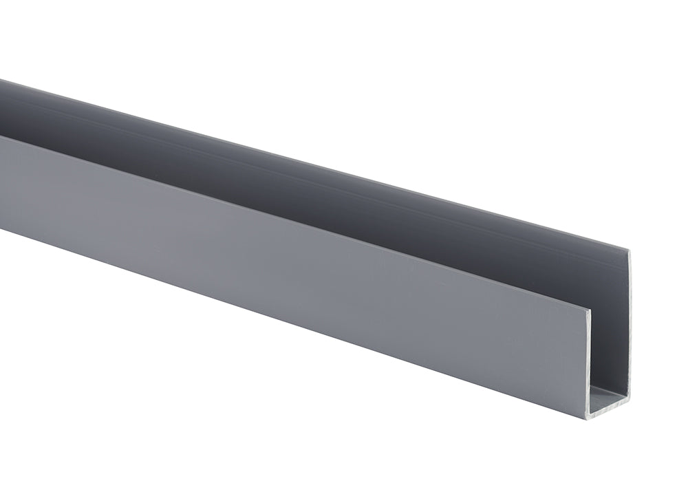 A close-up shot of a gray, U-shaped metal channel, viewed from a slight angle. The channel has clean lines and a smooth, matte finish, suggesting it could be a structural or decorative trim piece.