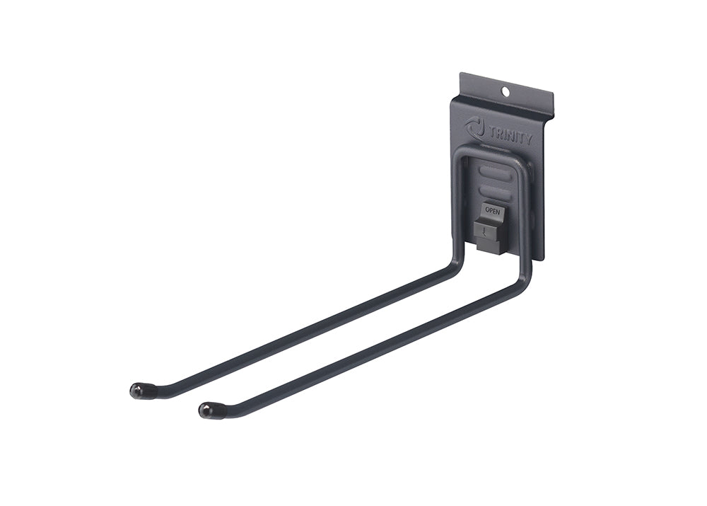 
A close-up shot shows a black, U-shaped pegboard hook with two prongs extending to the left. The backplate of the hook has the "TRINITY" logo and a small "OPEN" lever mechanism.
