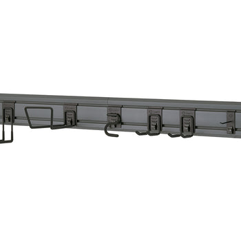 A wall-mounted gray garage organization system features a long track with various hooks and brackets attached. The hooks are designed to hold different types of tools and equipment, including a wide bracket for larger items, several smaller U-shaped hooks, and a single hook at the end.